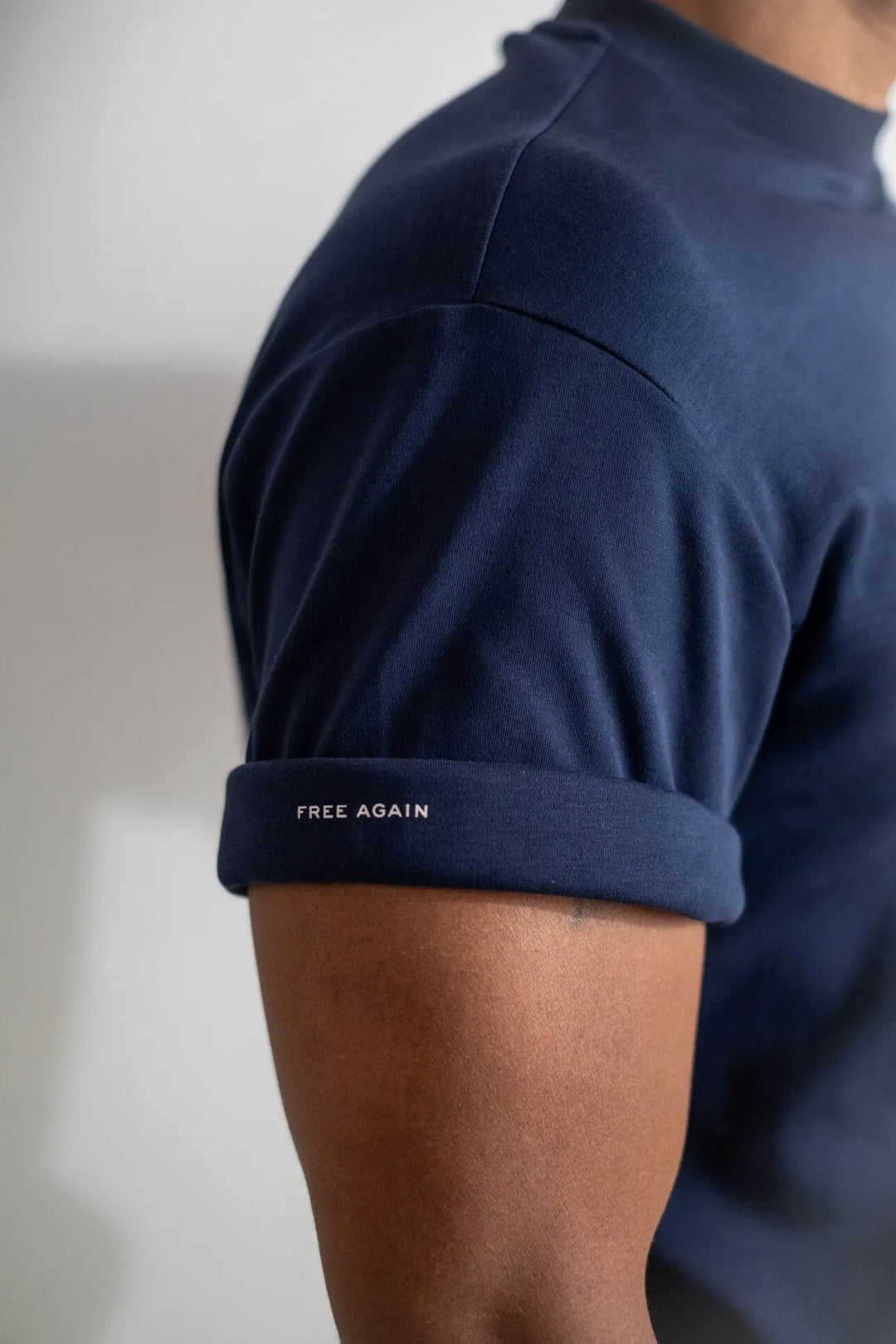 Rolled sleeve in Club Navy with the Free Again detail