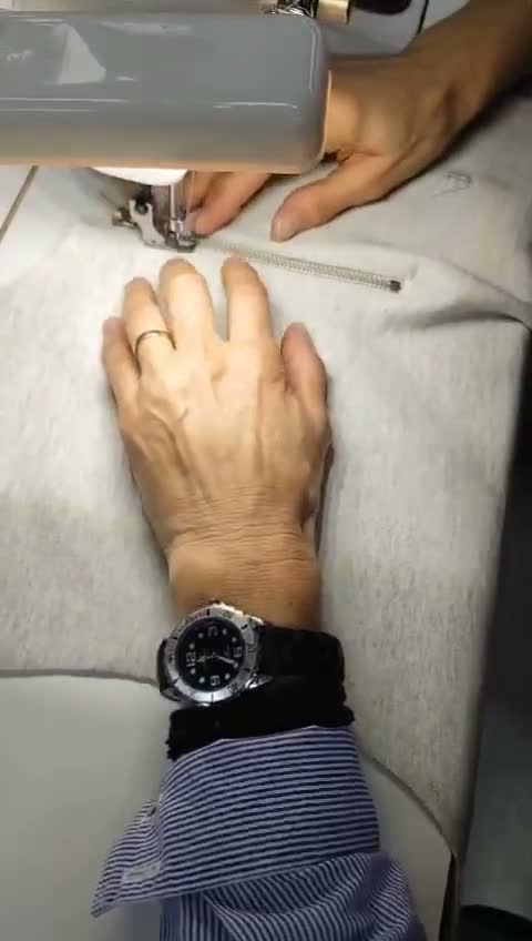 A zip being sewn in Portugal